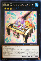 This is an image for the product Humhumming the Key Djinn that has a rarity of Rare in the Duelist Alliance with a card code of DUEA-JP088 that is available on the TEKKX Product website.