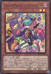 This is an image for the product Live☆Twin Lil-la Treat that has a rarity of Super Rare in the Blazing Vortex with a card code of BLVO-JP028 that is available on the TEKKX Product website.