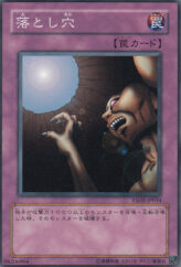 This is an image for the product Trap Hole that has a rarity of Common in the Starter Deck 2007 with a card code of YSD2-JP034 that is available on the TEKKX Product website.