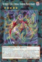 This is an image for the product Number C104: Umbral Horror Masquerade that has a rarity of Normal Parallel Rare in the Deck-Build Pack: Justice Hunters with a card code of DBJH-AE051 that is available on the TEKKX Product website.